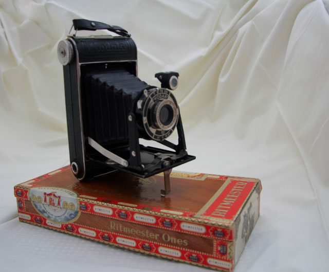 Vintage camera and cigar box